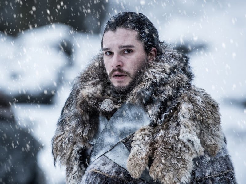 Kit Harington as Jon Snow wearing fur while it is snowing outside