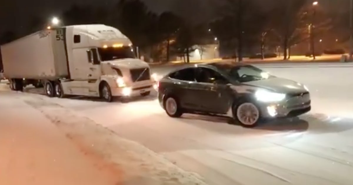 Elon Musk Shares Incredible Video of Tesla Model X Pulling a Truck in Snow