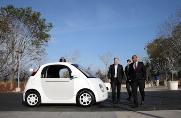MOUNTAIN VIEW, CA - FEBRUARY 02: U.S. Transportation Secretary Anthony Foxx (R) and Google Chairman ...