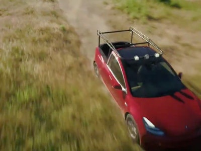 An insert from a YouTube video of a Tesla Model 3 that had been retrofitted into a pickup truck