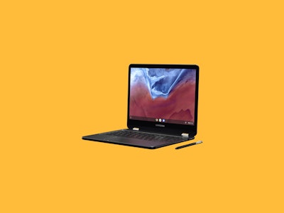 A laptop on an orange background