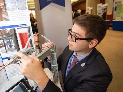 Justin Schiavo from Long Island showing his project at a science fair