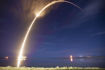 The arc of a successful rocket launch.