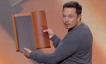 Musk holding a Tuscan roof tile