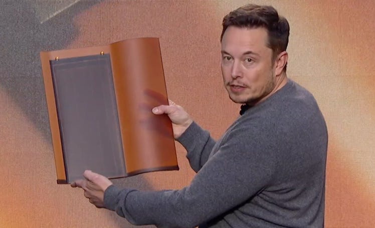 Musk holding a Tuscan roof tile