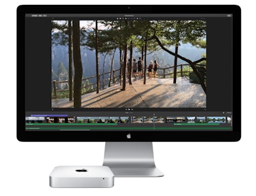 Mac Mini alongside an Apple display.