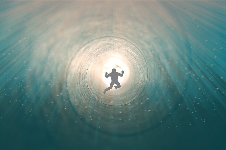 a person going through a vortex as they have a near death experience 
