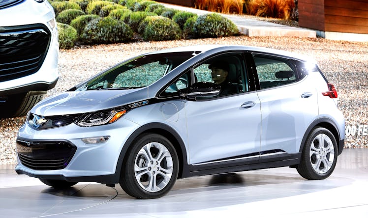 The all-electric Chevrolet Bolt EV is shown on stage after it won the Car of the Year Award at the 2...