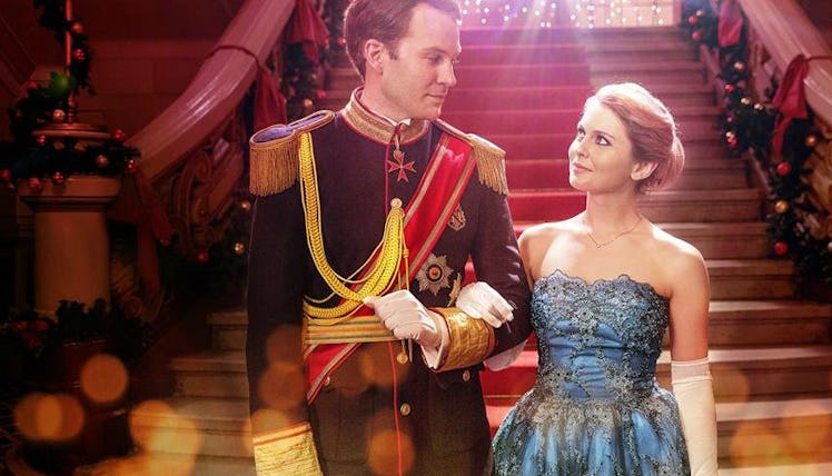 'A Christmas Prince' show where prince and princess are holding their hands and walking