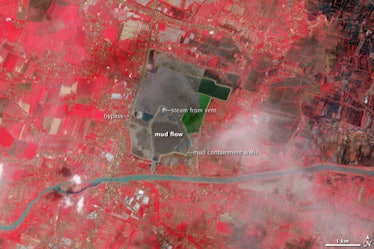NASA color image Lusi Indonesia mud spread city damage