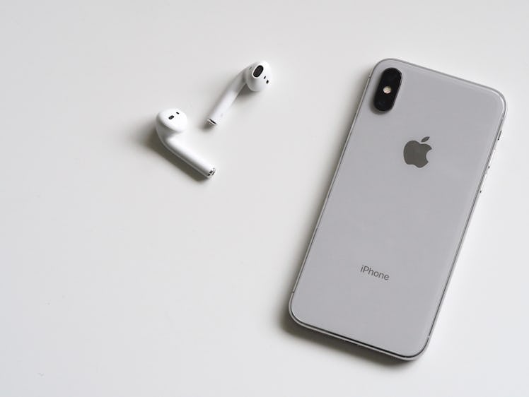 Silver Iphone X With Airpods 