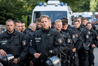 HAMBURG, GERMANY - JULY 06: Police wait at Hamburg harbor near the 'Welcome to Hell' anti-G20 demon...