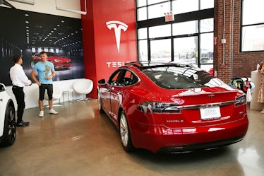 NEW YORK, NY - JULY 05: A Tesla model S sits parked in a new Tesla showroom and service center in Re...