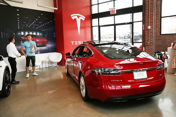 NEW YORK, NY - JULY 05: A Tesla model S sits parked in a new Tesla showroom and service center in Re...