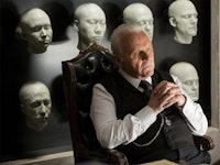 Anthony Hopkins sitting in a "Westworld" scene