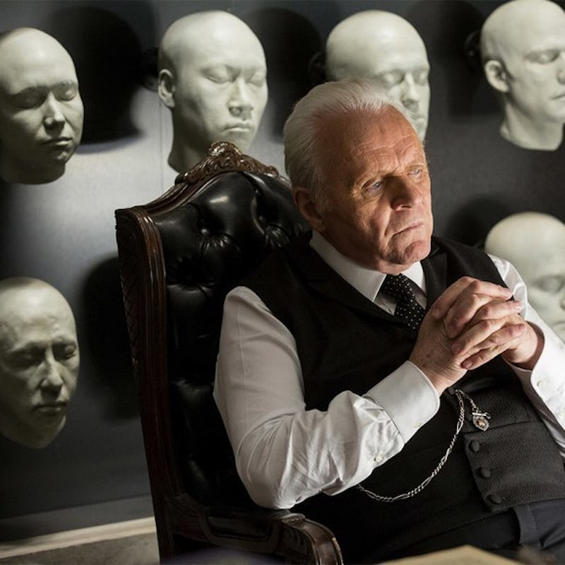 Anthony Hopkins sitting in a "Westworld" scene