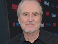 Wes Craven posing for a photo