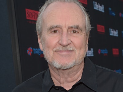 Wes Craven posing for a photo