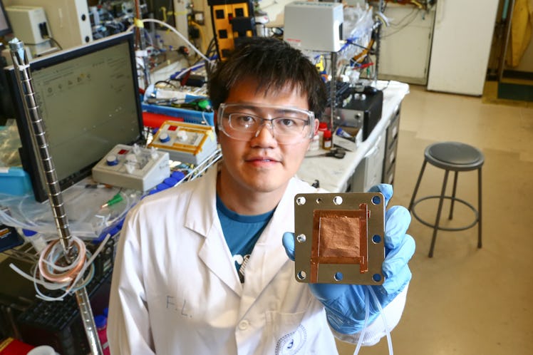 Coauthor Fengwang Li (above) demonstrates the copper-based catalyst that the team designed for CO2 c...