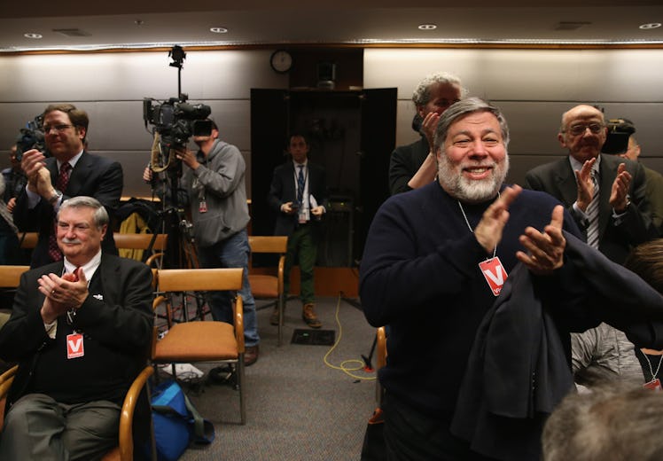 WASHINGTON, DC - FEBRUARY 26: Apple Co-Founder Steve Wozniak (R) applauds after the Federal Communic...