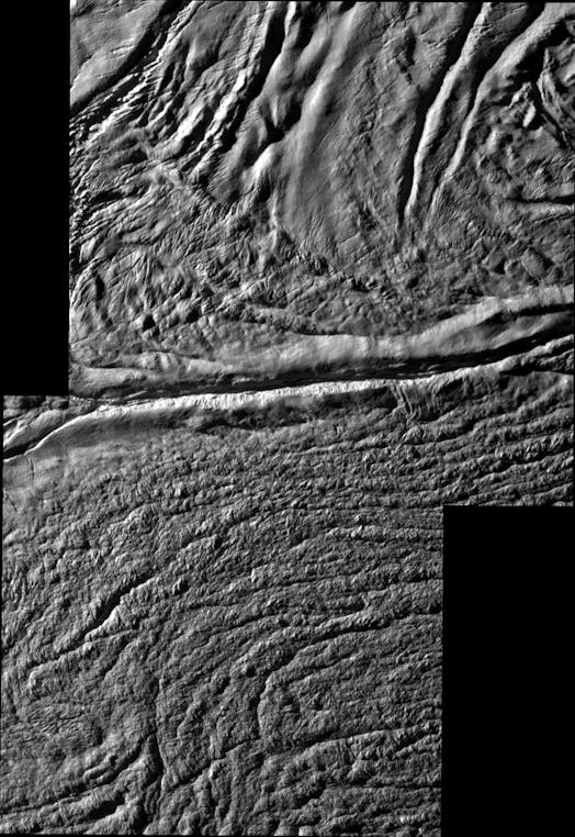 A close-up view of the crevices that formed on the surface of Saturn's icy moon.