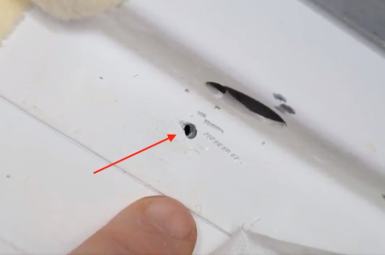 ISS hole with arrow annotation
