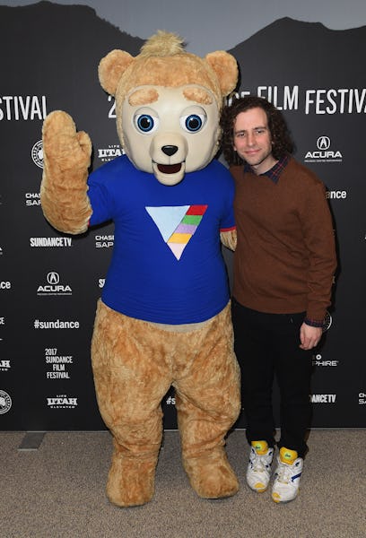 Kyle Mooney next to a person wearing a Brigsby Bear costume 