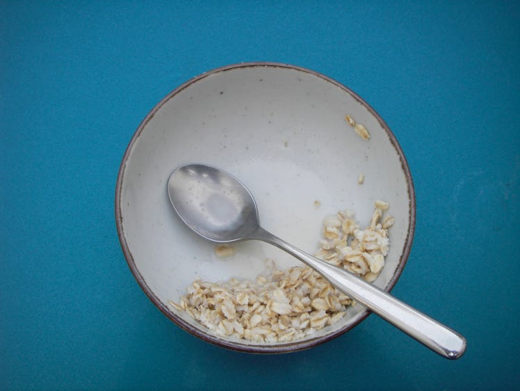 Rolled oats in a white bowl