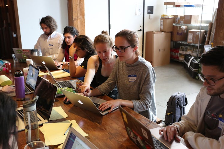 Coders work diligently on abortion access apps at the Hackathon in San Francisco