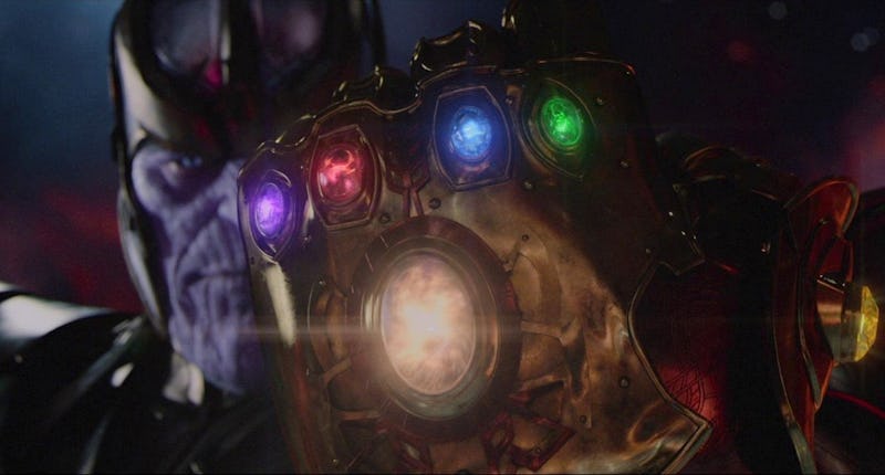 Thanos wearing the infinity gauntlet with all of the infinity stones in it