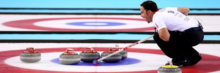 A man curling at the 2018 Olympics 