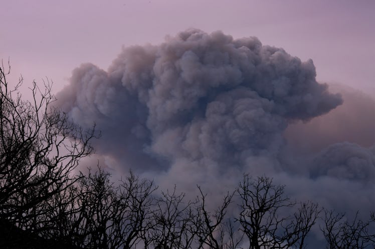 CARPINTERIA, CA - DECEMBER 10: A plume of smoke is seen from Ojai, California as the Thomas Fire gro...