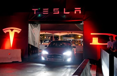 HAWTHORNE CA - OCTOBER 09: Tesla owners take a ride in the new Tesla 'D' model electric sedan after ...