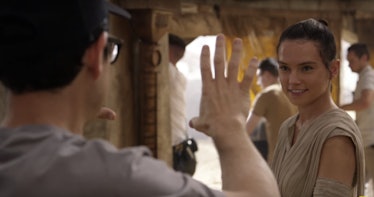 J.J. Abrams and Daisy Ridley in 'Star Wars: The Force Awakens'