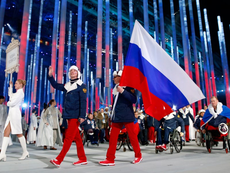 Russian athletes carrying their flag at the 2014 Sochi Olympic games