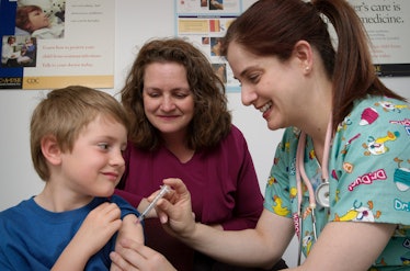 boy receives vaccine