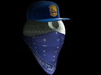 A blue Golden State Warriors cap and a blue bandana