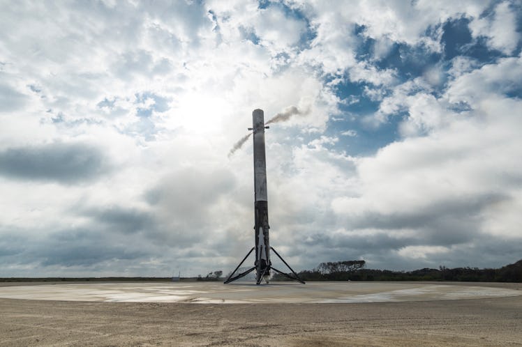 A Falcon 9 first-stage rocket booster back on Earth at the LZ-1 landing pad in February.