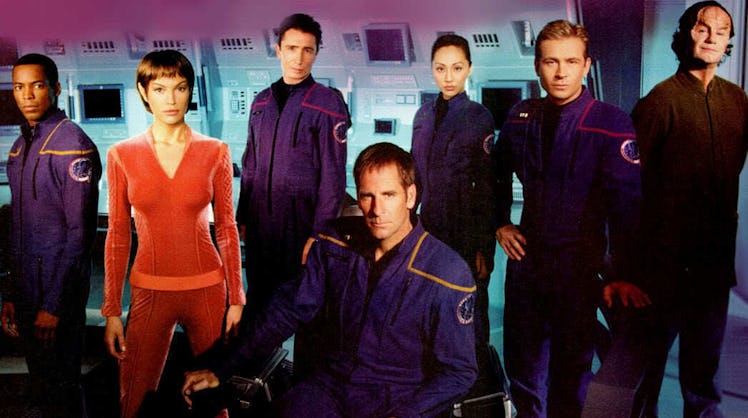 The cast of Star Trek Enterprise posing together in costumes