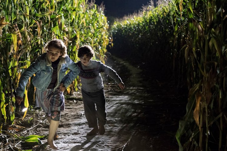 Millicent Simmonds and Noah Jupe play siblings Regan and Marcus Abbott in 'A Quiet Place'.