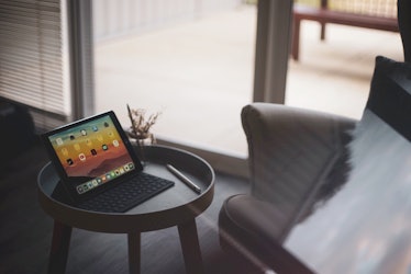 An iPad Pro on a small table