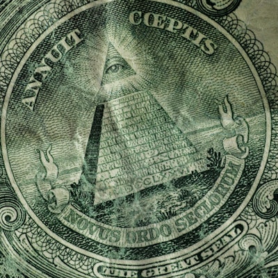 Close up of the pyramid that's located on the dollar bill