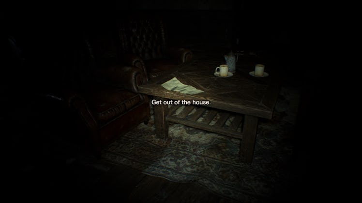 "Get out of the house" text sign on dark background