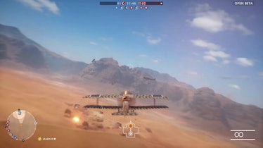 Warplane flying over the desert.