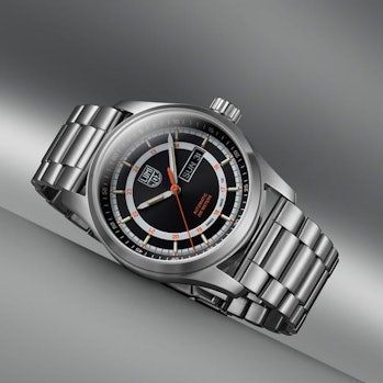 Swiss-built designer watch with stainless steel straps and quartz display