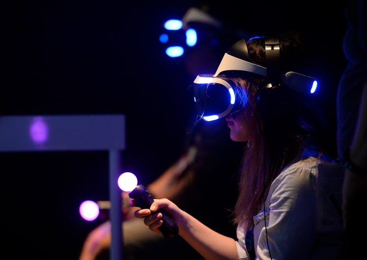 A female gamer trying the Sony VR headset