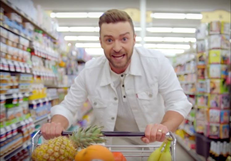 A picture from Justin Timberlake's music video where he's pushing a cart full of groceries