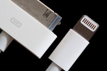 Side by side: Apple's old 30-pin "Dock Cable" (left) with the new "Lightning Cable" (right)