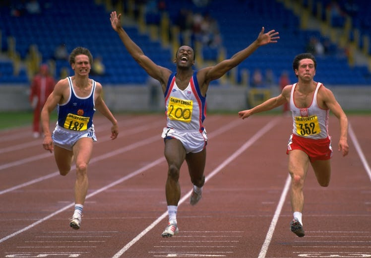 An athlete crossing the line at a running race