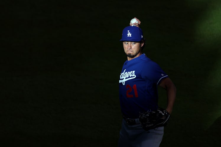 HOUSTON, TX - OCTOBER 29: Yu Darvish #21 of the Los Angeles Dodgers warms up before game five of the...